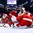 BUFFALO, NEW YORK - DECEMBER 30: Canada's Jonah Gadjovich #11 attempts a shot on Denmark's Emil Gransoe #1 during the preliminary round of the 2018 IIHF World Junior Championship. (Photo by Andrea Cardin/HHOF-IIHF Images)

